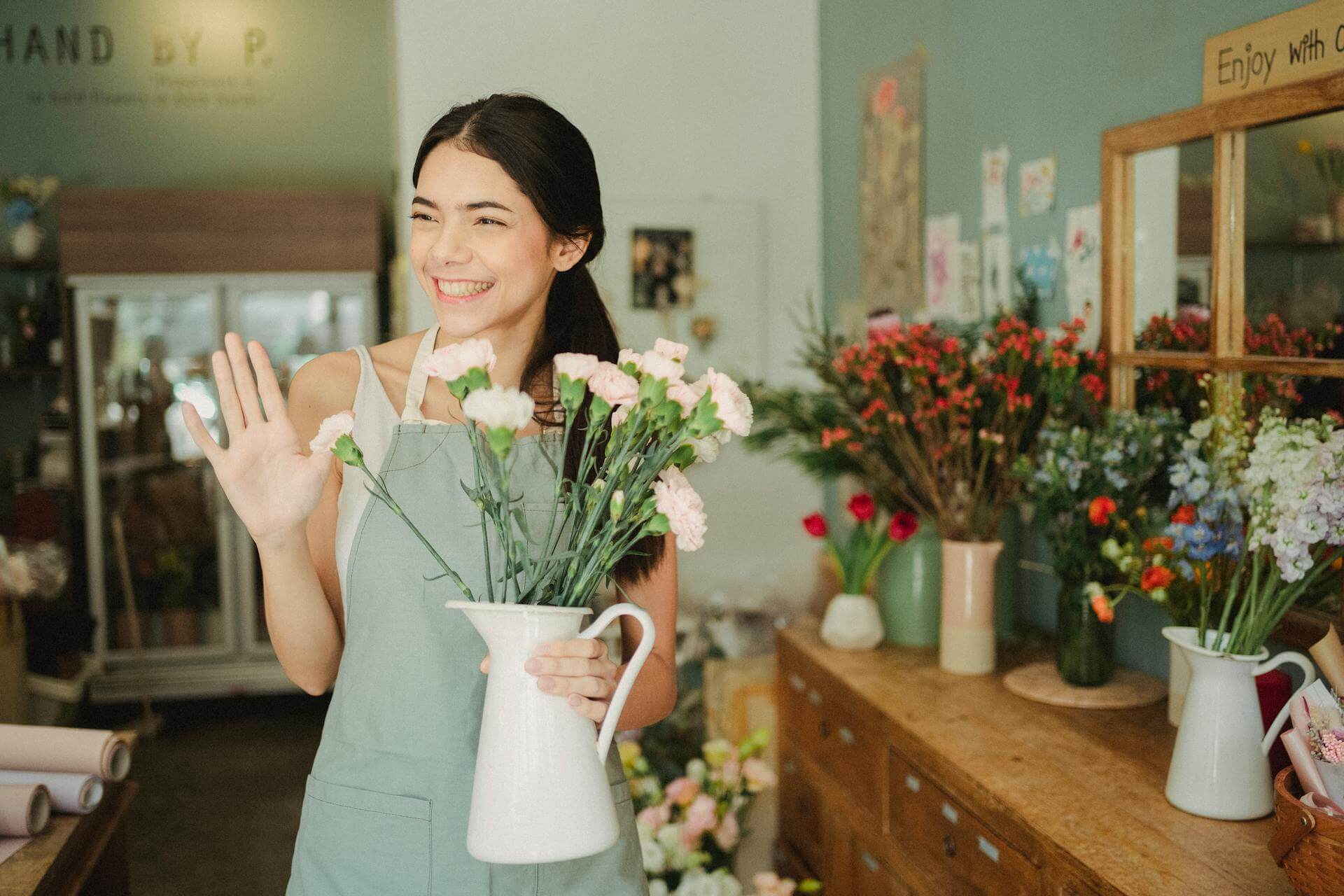 Woman Holding Flowers Hospitality Image